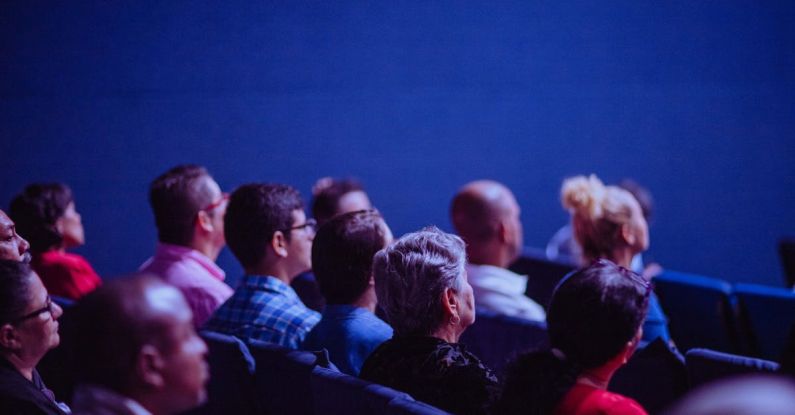 Conferences - People Sitting on Gang Chairs