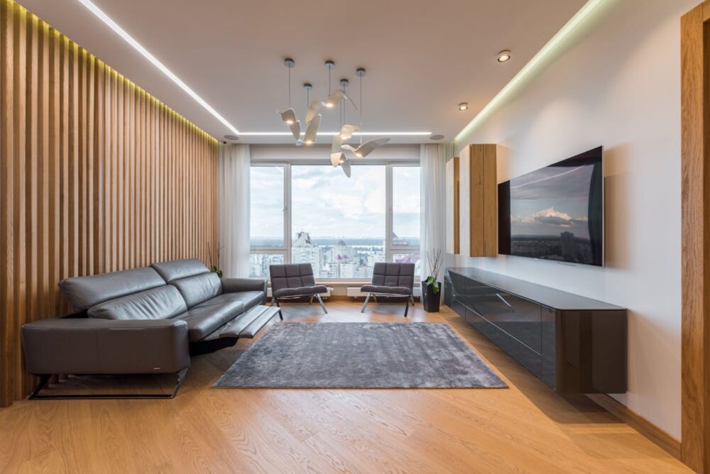 modern-spacious-interior-of-lounge-with-tv-and-leather-sofa